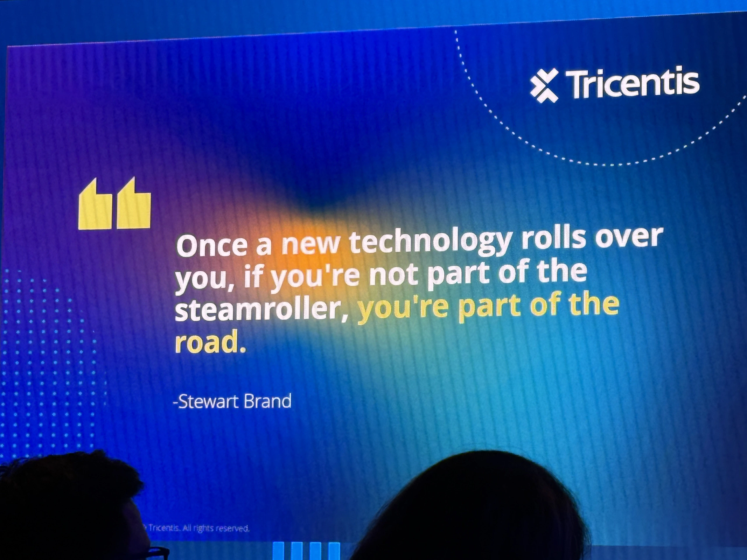 Tricentis presentation slide showing a Stewart Brand quote about new technology